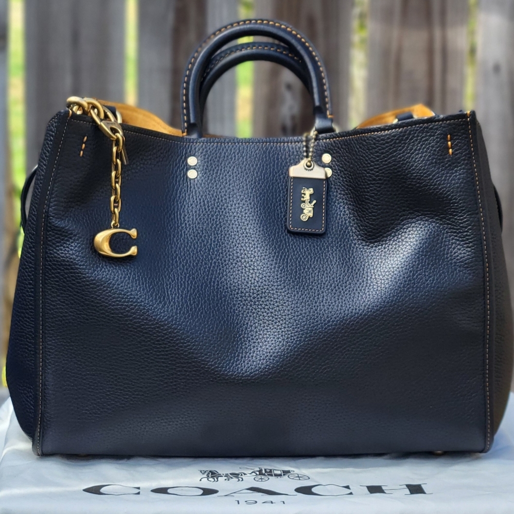 DO NOT PURCHASE!!Coach Rogue 39